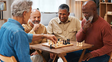 Image showing Chess, friends and board games on wooden table thinking of strategic or tactical move at home. Senior group of men playing and holding or moving white piece for attack in game of skill and tactics