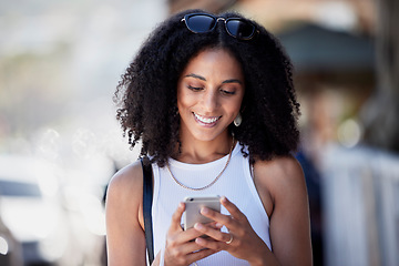 Image showing Black woman, afro and phone on city social media, sales promo or clothes discount deals on internet website. Smile, happy and relax urban fashion on mobile technology, retail customer or consumer app