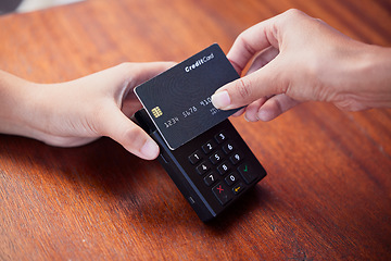 Image showing Shopping, payment and hands with a credit card and machine for finance, service and retail. Store, buying and customer paying for a sale, coffee or electronic transaction in a shop or boutique