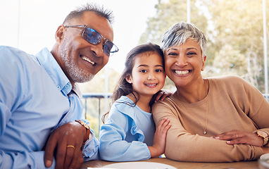 Image showing Family, portrait of grandparents and child in cafe on summer holiday together with smile and happiness. Mature man, woman and little girl at table in restaurant for lunch while on vacation with love.