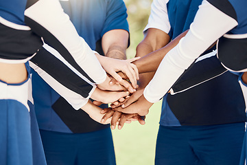 Image showing Hands, teamwork and motivation with cheerleaders in a huddle for support during a sports game or competition. Training, event and a group of cheerleading women in a circle for a performance