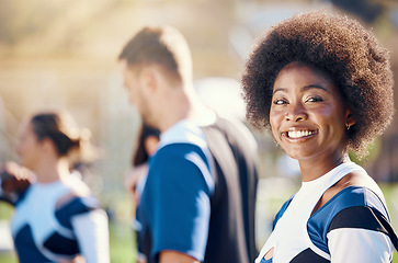 Image showing Happy, sports and portrait of a black woman at cheerleading, rehearsal and team practice. Smile, cheerful and African cheerleader at a sport event, competition or performance with a squad on a field