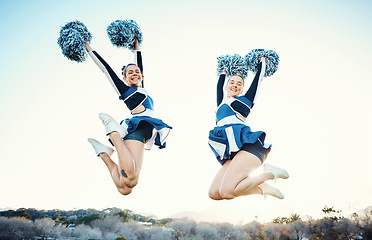 Image showing Cheerleader, women team and sports jump outdoor for fitness, training and celebration for win. Teamwork of athlete people together for competition, blue sky and motivation for cheerleading portrait