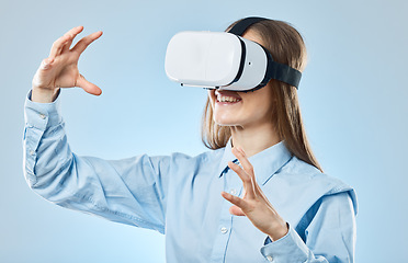 Image showing Business, futuristic and woman with virtual reality glasses, metaverse and online learning against a blue studio background. Female employee, entrepreneur and lady with vr, futuristic and innovation