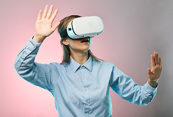 Image showing Virtual reality headset, metaverse and futuristic tech, young woman on pink background, AI and user experience. Gen z, VR goggles and video gaming with gamer, cyber space and scifi in digital world