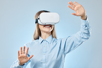 Image showing Future, woman and virtual reality glasses for online planning and innovation against a blue studio background. Female employee, lady or consultant with vr, eyewear and futuristic with happiness