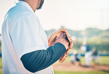 Image showing Baseball, pitcher and fitness with man on field for throwing, training and practice in competition match. Workout, focus and skills with athlete playing in park stadium for exercise, league and game