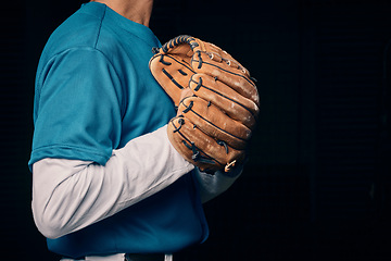 Image showing Baseball pitcher, hand and glove in studio for sport, training and throwing by black background. Man, cropped and hands for exercise, strikeout or athlete with sports, game or competition for workout