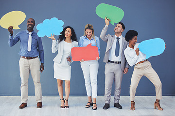 Image showing Speech bubble, group and happy business people holding comment, news and voice icon feeling excited together. Team opinion on social media with mockup space in studio blue background