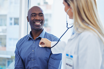 Image showing Patient, doctor woman and consultation with stethoscope in hospital for cardiology or health insurance. Black man and healthcare person talking about lungs, breathing and advice for healthy heart