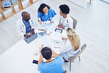 Image showing Above, healthcare and meeting by doctors on laptop for research, planning and innovation at hospital. Doctor, team and health experts brainstorm, problem solving or discussing online project together