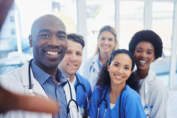 Image showing Healthcare, portrait and selfie by doctors at hospital, happy and proud, smile and bond on blurred background. Face, diversity and group pose for photo, profile picture or website homepage update