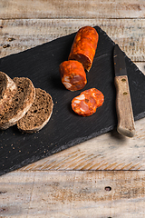 Image showing Malt loaf bread and chorizo slices