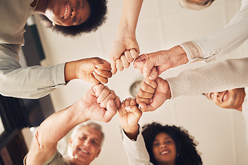 Image showing Portrait, hands fist bump and business people happy for diversity, company solidarity or collaboration. Corporate group, mission teamwork and below view of design team building for community support