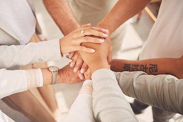 Image showing Business women, hands together and unity above in partnership or trust for teamwork, collaboration or support at office. Woman group piling hand in team building for cooperation, motivation or union