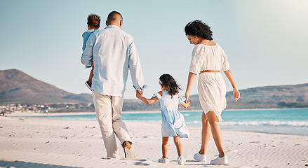 Image showing Holding hands, family love and beach walking, bonding or enjoy quality time together for vacation, holiday peace or freedom. Sea water, ocean and back view of travel people in Rio de Janeiro