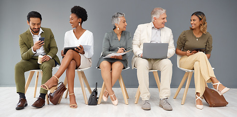 Image showing HR, technology and business people waiting in line for a recruitment interview. Hiring, resume or cv with a man and woman employee sitting in a human resources candidate line for opportunity