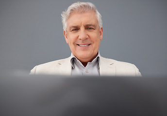 Image showing Senior, computer and professional business man isolated on a gray background for online planning and market research. Corporate person, boss or executive working on laptop tech for asset management
