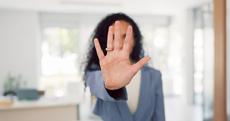 Image showing Business woman and face with stop hand for assertive and serious gesture for rejection at workplace. Corporate black woman in office portrait with palm zoom for warning, discrimination or harassment