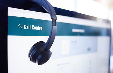 Image showing Headset, computer or screen in call center, customer service or contact us office for help, support or b2b lead generation. Zoom, headphones or telemarketing equipment on consulting technology in crm