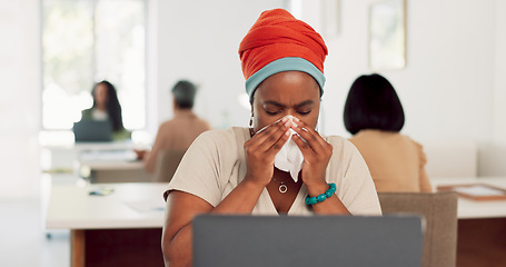 Image showing Black woman, sneeze and tissue blowing nose for sick, ill or flu by laptop at the office desk. African American woman employee with cold symptoms, virus or illness by computer at the workplace
