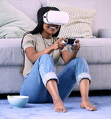 Image showing Woman, video games and virtual reality headset on home floor for online gaming, ar and relax. Gamer person with console for vr metaverse, esports and cyber or 3d digital world with futuristic tech