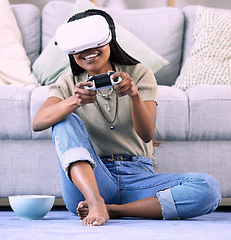 Image showing Black woman, video games and virtual reality gaming on home floor for metaverse, ar and ux. Gamer person with console and vr headset for cyber or 3d digital world streaming with futuristic tech