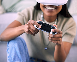 Image showing Video games, hands and virtual reality gaming at home with black woman for metaverse, ar and ux. Gamer person with console and vr headset for cyber or 3d digital world streaming with futuristic tech