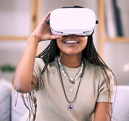 Image showing Future, virtual reality glasses and black woman in lounge, esports and connection for metaverse. Futuristic, African American girl with vr, smile and 3d gaming in living room or stress relief