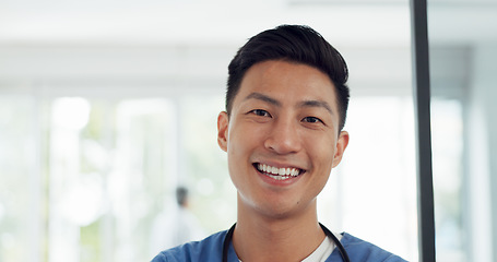 Image showing Asian man, face and doctor smile for healthcare, vision or career ambition and advice at the hospital. Portrait of happy and confident Japanese medical expert smiling, phd or medicare at the clinic