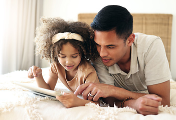 Image showing Tablet, learning child and father teaching for online development, home education and relax on bed. Dad or black man with girl on digital technology for internet game, helping and bonding together