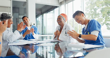 Image showing Doctors, nurses and meeting with documents in hospital discussing medical records. Teamwork, planning and group of healthcare professionals, men and women with paperwork talking in training workshop.