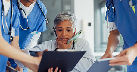 Image showing Busy, phone call and doctor with medical paperwork, health communication and help from nurse team at a hospital. Chaos, stress and healthcare consultant with anxiety from working medicine at a clinic