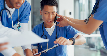 Image showing Busy, phone call and doctor with medical paperwork, hospital chaos and anxiety from healthcare work. Clinic schedule, communication and Asian nurse with help from employees during overwhelming agenda