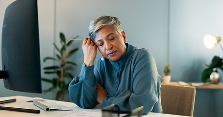 Image showing Stress, headache and burnout with a business woman suffering from anxiety while working in her office. Compliance, mental health and migraine with a senior female employee feel frustrated at work