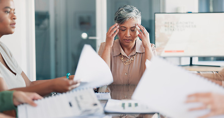 Image showing Headache, meeting and business woman stress, pain or anxiety, thinking of documents review. Burnout, fatigue or frustrated senior boss or manager in busy office with chaos of paperwork and team hands