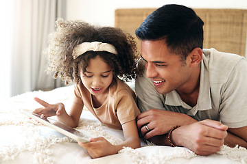 Image showing Child learning, tablet and father teaching for online development, home education and relax on bed. Dad or black man with kid on digital app technology for internet game, helping and bonding together