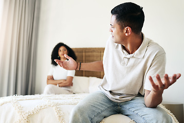 Image showing Argument, stress and couple in bedroom for conflict, breakup conversation and communication. Sad, angry and man speaking to a woman about relationship, divorce and frustrated with problem in marriage