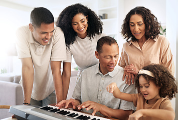 Image showing Family, keyboard piano and play music with grandparents, parents and child with people bond at home. Happiness, relationship and generations, teaching and learning, creativity and musical instrument