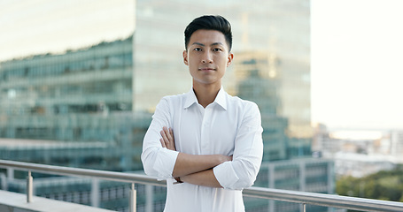 Image showing City, asian and face of businessman with corporate success, financial growth vision and company strategy in urban development. Proud, leadership and Seoul business man, boss or executive on a balcony