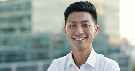 Image showing Happy, smile and face of businessman in city for management, leadership or vision. Professional, executive and future with portrait of Asian employee on rooftop of startup for mindset, career or goal