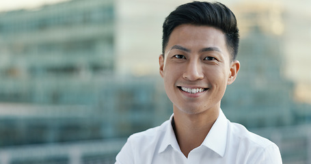 Image showing Happy, smile and face of businessman in city for management, leadership or vision. Professional, executive and future with portrait of Asian employee on rooftop of startup for mindset, career or goal