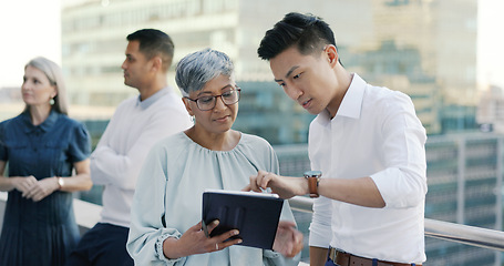 Image showing Business people diversity, tablet or office balcony in digital marketing research, strategy planning or calendar management. Mature ceo, talking manager or internship training schedule on technology