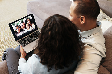 Image showing Couple, laptop screen and video call on home sofa for communication and network connection. Man and woman in living room with technology for above virtual conversation, distance family chat or relax