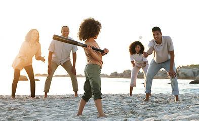 Image showing Baseball, big family and girl play at beach, having fun and enjoying holiday together. Care, sunset and mother, grandparents and happy father throw ball at kid, playing sports and bonding by ocean.