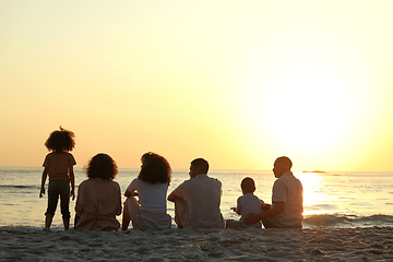 Image showing Relax, sunset and travel with big family on beach for vacation, support and happiness. Bonding, summer break and holiday trip with parents and children at coast for care, generations or nature mockup