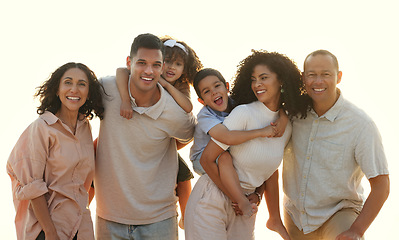 Image showing Sunset, big family and portrait smile at beach, having fun and smiling on vacation outdoors. Care, bonding and happy kids, grandmother and grandfather with parents laughing and enjoying holiday time.