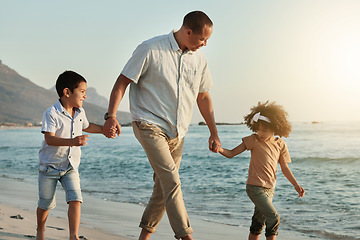 Image showing Holding hands, children and grandfather walking on beach, having fun or bonding outdoors. Love, care and happy grandpa with kids, boy and girl by ocean or seashore enjoying holiday vacation at sunset