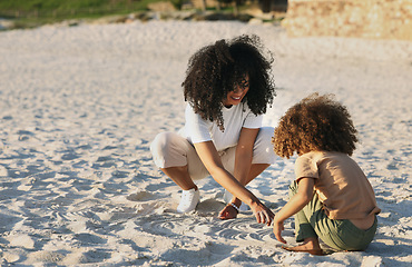 Image showing Black family at the beach, mother and child play in sand on summer holiday, freedom and travel with nature outdoor. Fun together, vacation and carefree with happiness, woman and girl in Jamaica