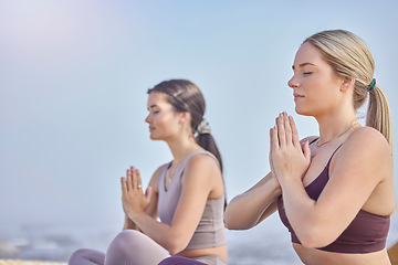 Image showing Meditation hands, outdoor and women exercise in nature for fitness, peace and wellness. Yoga friends on blue sky for namaste prayer workout, training and energy for mental health, chakra and zen mind